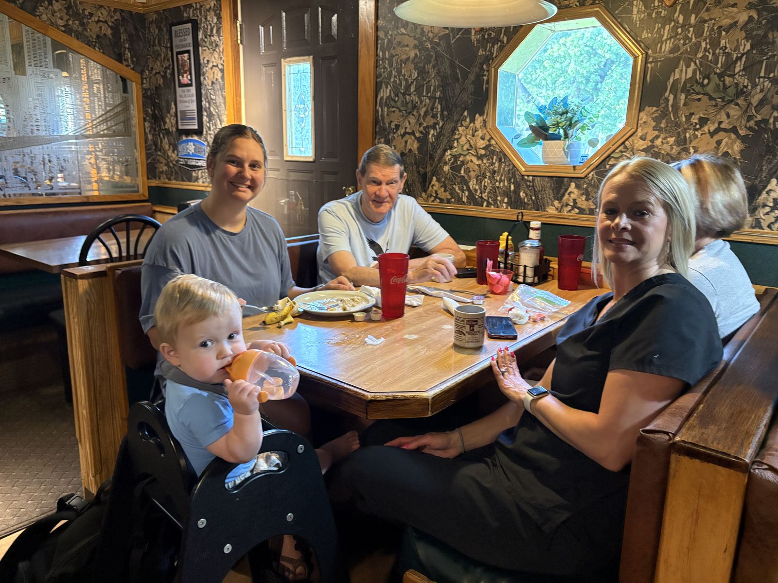 Three generations sharing a booth at breakfast
